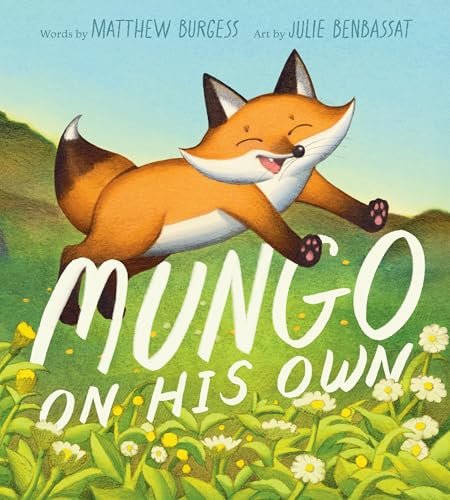 Orange fox running in a green field with white daisies.