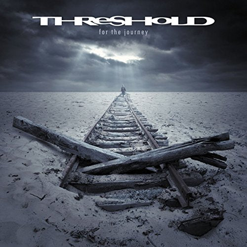 CD cover: desolate beach with railway tracks leading to a distant figure.