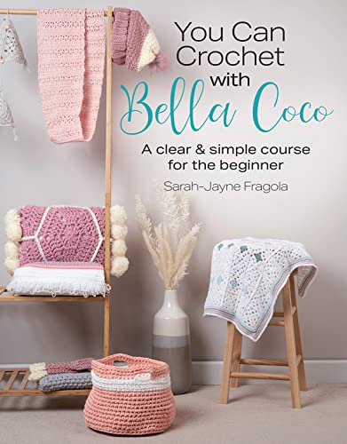 Book with crochet patterns and instructions, featuring colorful yarn and hook on cover.