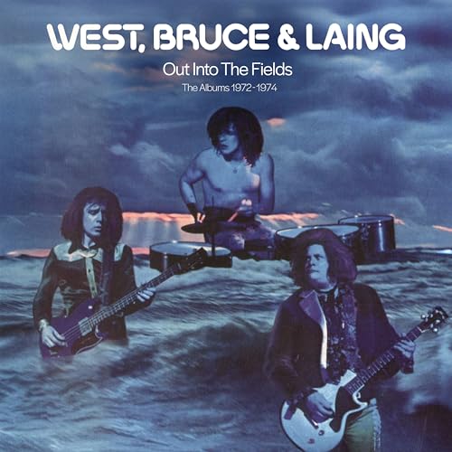 West, Bruce & Laing band members playing instruments in a sea under a cloudy sky.