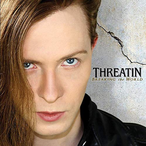 CD cover featuring a close-up portrait of a man with long hair.