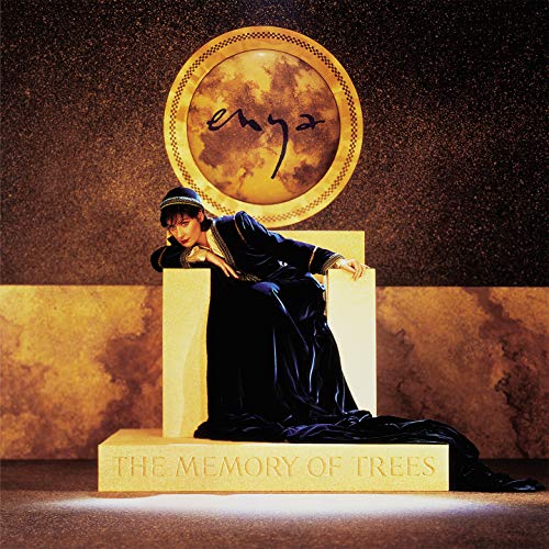 Enya album cover: woman in dark robes seated on a stone pedestal.