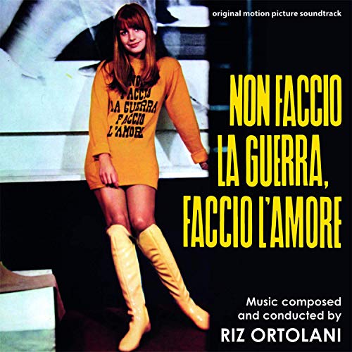 CD cover: woman in yellow dress and boots, bold text design.
