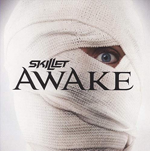 CD cover for Skillet’s “Awake” featuring a face partially wrapped in bandages.