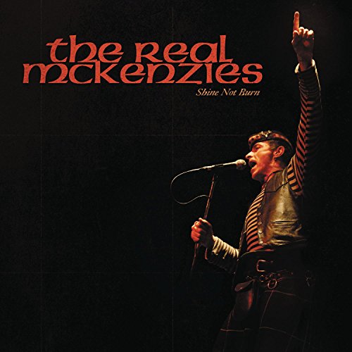 Album cover for The Real Mckenzies, featuring a singer with raised arm.