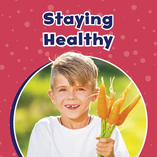 Book cover, “Staying Healthy,” featuring a child holding carrots.