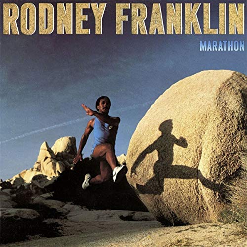 Album cover: Rodney Franklin running near a large rock formation.