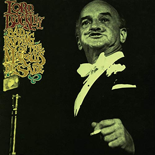 Lord Buckley album cover: a smiling bald man in a tuxedo with a microphone.