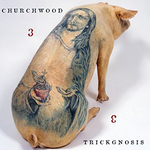 CD cover featuring a pig with an image of Jesus painted on its side.