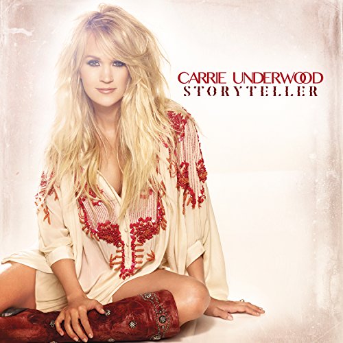 Carrie Underwood album cover, blonde woman in embroidered top and boots.