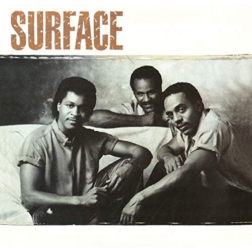 Album cover for Surface featuring three Black men in a relaxed pose.
