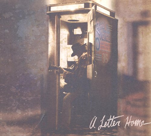 Man with guitar in a vintage phone booth, album cover.