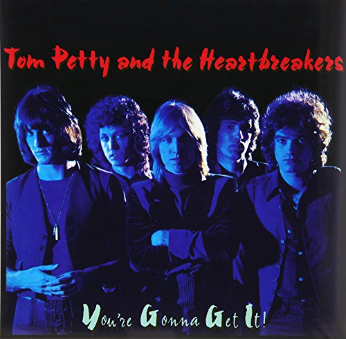 Tom Petty and the Heartbreakers album cover, four men in a row.