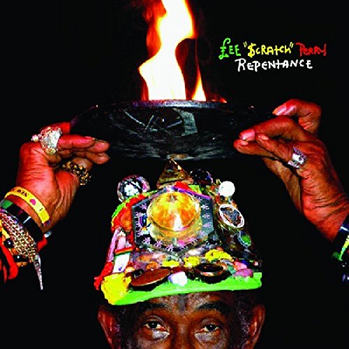 CD cover: hands holding a decorated head with a burning flame.