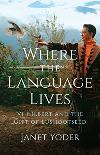 Book cover featuring Vi Hilbert with a bird, mountains in the background.