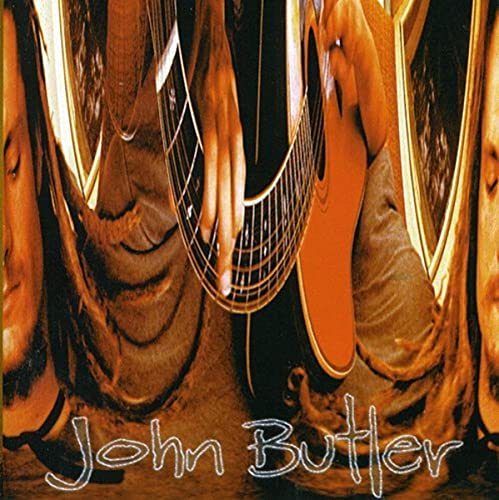 CD cover for John Butler’s album featuring a musician and guitar.