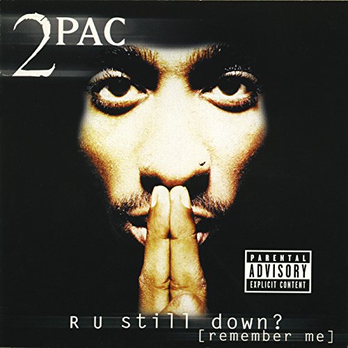 2Pac album cover: close-up of artist with hands covering mouth.