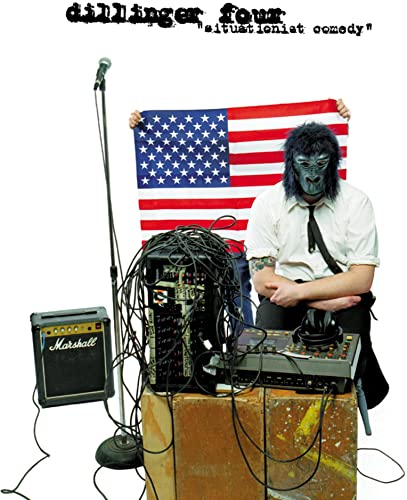 CD cover: gorilla in mask with American flag, microphone, and amplifier.