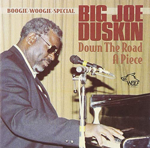 CD cover featuring portrait of Big Joe Duskin at a piano with microphone.