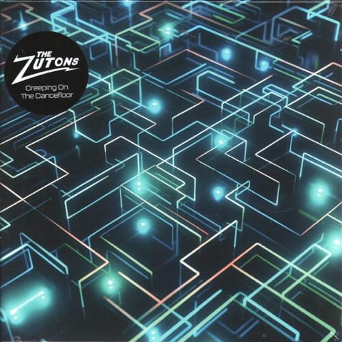 Vinyl record cover for The Zutons' "Creeping On The Dancefloor" with abstract neon lines.
