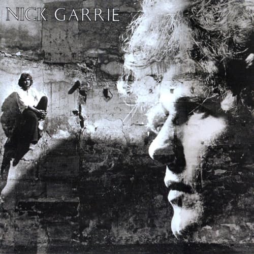 Vinyl album cover featuring a blurred, distressed portrait of a man.