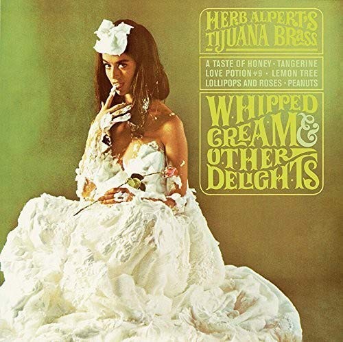 Album cover for Herb Alpert’s “Whipped Cream & Other Delights” vinyl record.