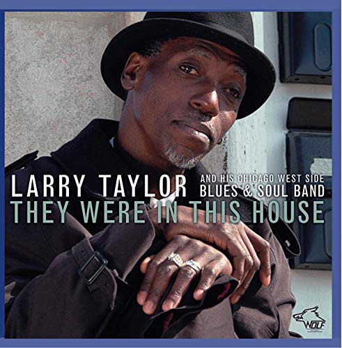 Larry Taylor album cover: portrait of a man in a hat.