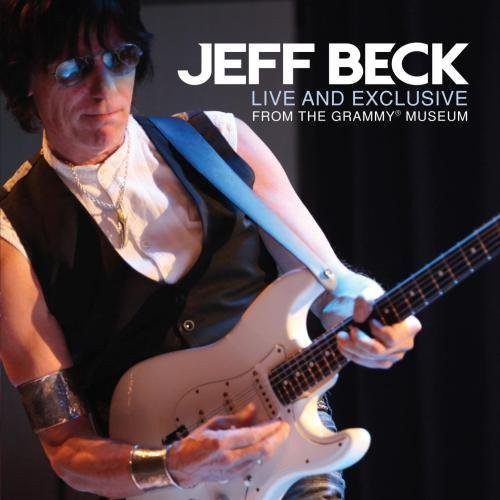 Jeff Beck playing a white electric guitar, album cover art.