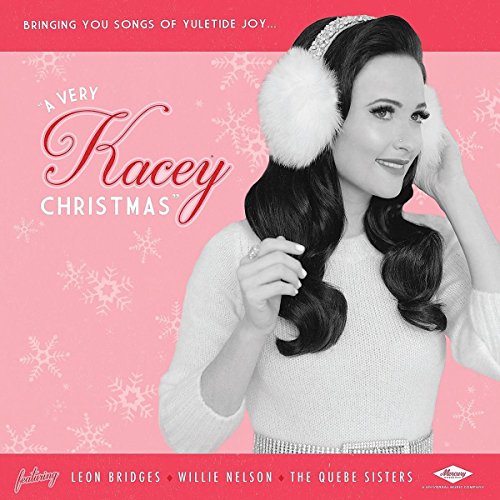 Kacey Musgraves album cover, wintry aesthetic, featuring artist in earmuffs.