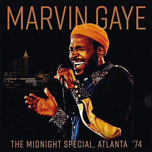 CD cover of Marvin Gaye singing into a microphone wearing an orange beanie.