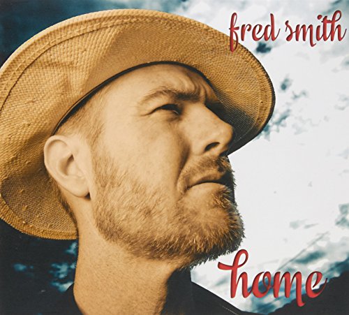 CD cover: Fred Smith looking up wearing a straw hat.