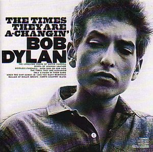 Bob Dylan album cover, portrait of a young man looking down.