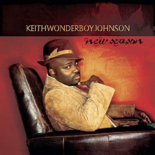 CD cover featuring Keith Wonderboy Johnson in a hat and suit.