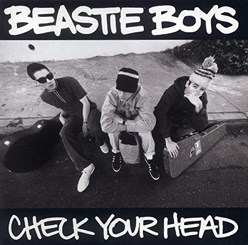 Beastie Boys "Check Your Head" CD cover with three men in hats.