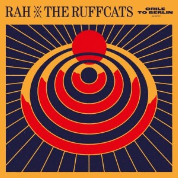 Vinyl record cover: concentric circles with a red sunburst design.