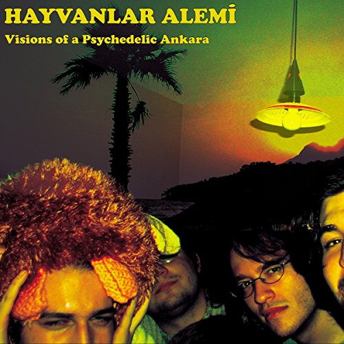 Album cover: three men, palm tree, and a glowing lamp on a beach.