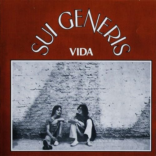 Vinyl record cover: "Sui Generis - Vida" with two people seated.