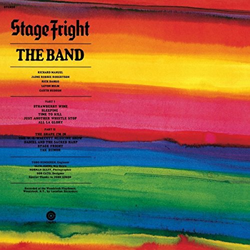 The Band" album "Stage Fright" vinyl record with colorful, abstract cover art.