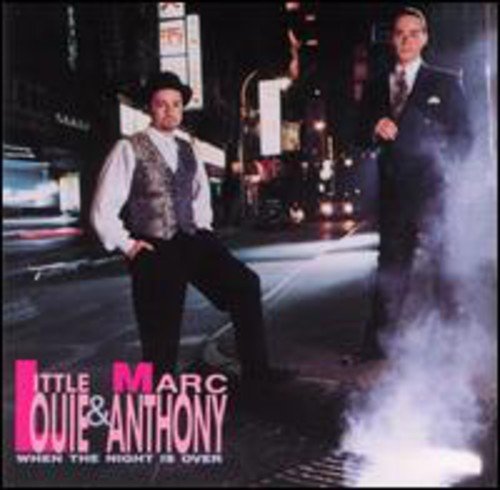 CD cover featuring two men in suits standing on a city street.