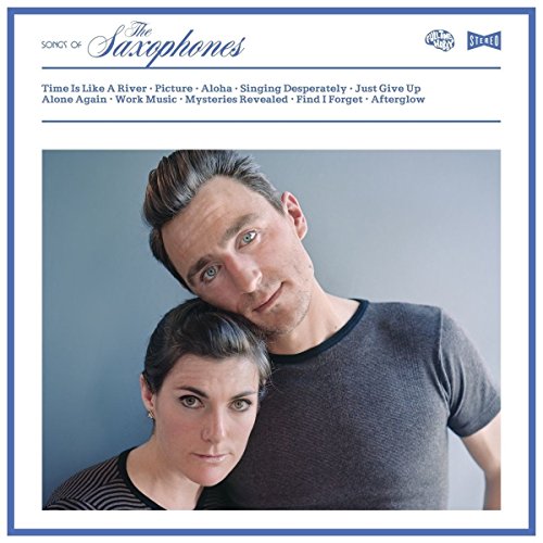 LP album cover featuring a portrait of a man and woman, titled “Songs Of Saxophones.”