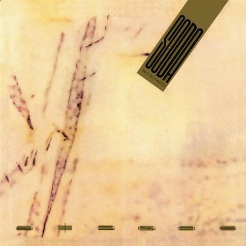Soda Stereo “Signos” CD cover: abstract beige texture with gold accents.