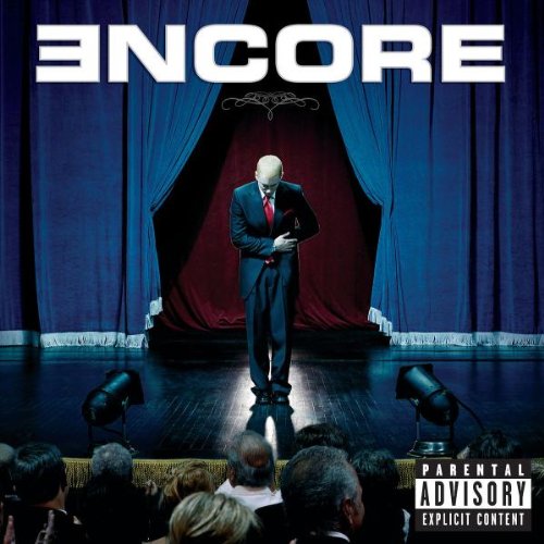 Eminem’s “Encore” album cover: man in suit before a stage and audience.