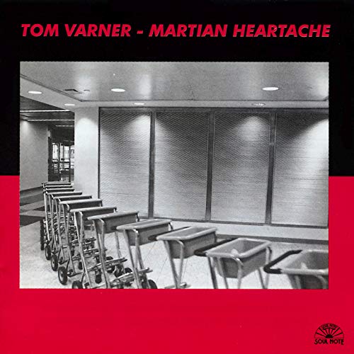 CD cover for Tom Varner’s “Martian Heartache” with a grayscale airport scene.