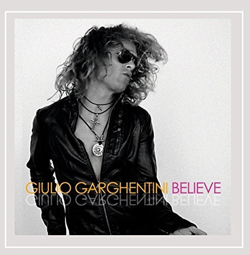 CD cover featuring a man with curly hair and sunglasses in a leather jacket.