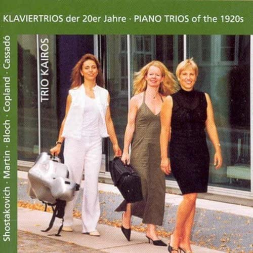 CD cover featuring three women walking with musical instrument cases.
