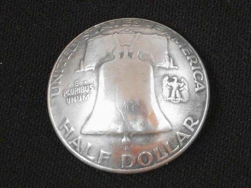 Silver half dollar coin depicting the Liberty Bell, close-up view.