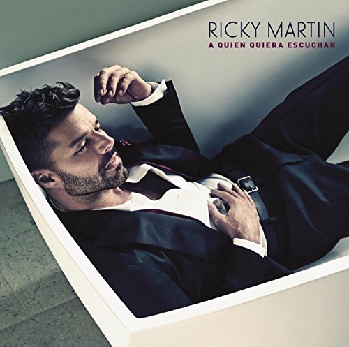 Ricky Martin album cover: man in a suit reclines in a bathtub.