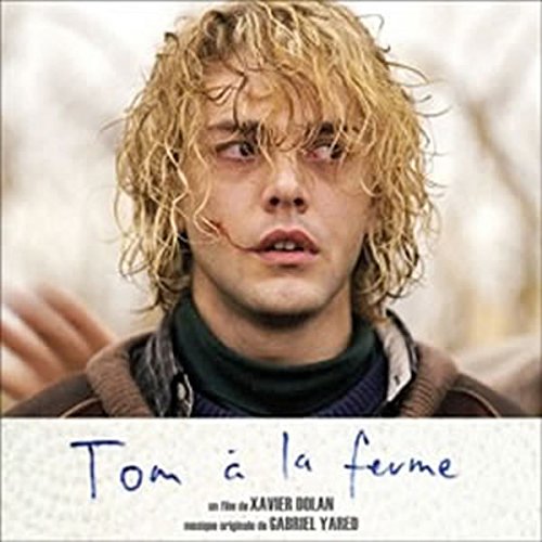 CD cover featuring a young man with curly hair and the title “Tom à la ferme”.