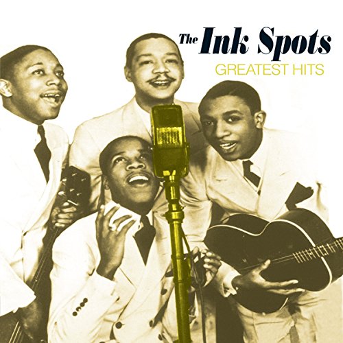 Vintage photo of The Ink Spots, a four-man vocal quartet with a guitar.
