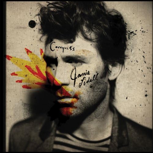 Jamie Lidell's "Compass" CD cover: portrait with yellow paint splatters.